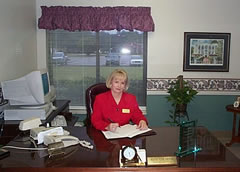 Rita Culvern at Desk