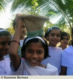 Indian Girl carrying container